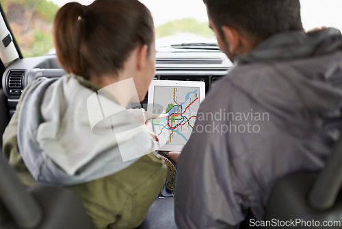 Image of Couple, car and gps on road trip with map for direction, vacation and travel to destination in countryside. Woman, man and tablet in vehicle for navigation and location to holiday journey and tourism