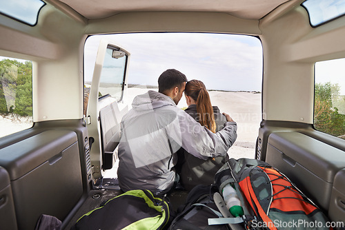 Image of Couple, road trip and car hug for adventure, travel or transport in nature for vacation. Love, affection and motor vehicle for outdoor holiday or honeymoon or explore in dunes for rural getaway