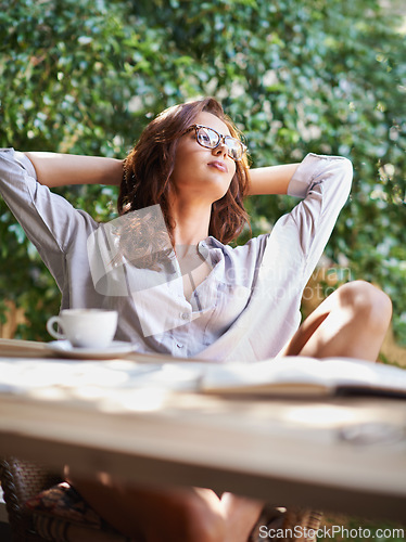 Image of Cup, thinking and woman at coffee shop, cafe and restaurant to relax for tea, cappuccino and espresso on break. Gen z girl, female person and lady with vision, idea and book for reading outdoor