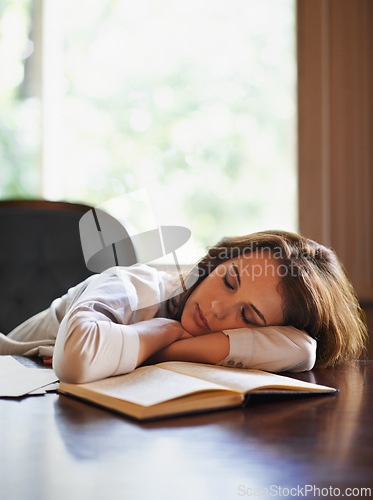 Image of Sleep, remote worker and tired woman with books, fatigue or snooze while writing in home office. Freelance, burnout or female writer nap in a house exhausted by reading, research or novel notes