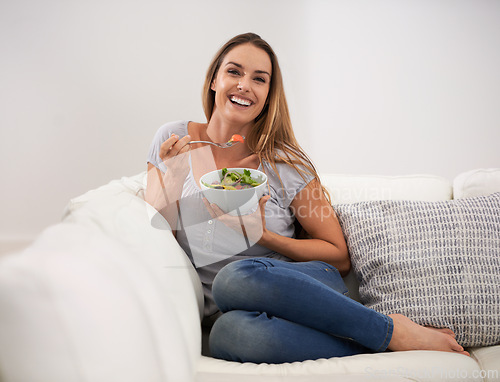 Image of Portrait, salad and happy woman on home sofa, diet and nutrition for heath and detox. Weight loss, food and vegetables for vegan female person, vitamins and fibre for digestion and wellness benefits