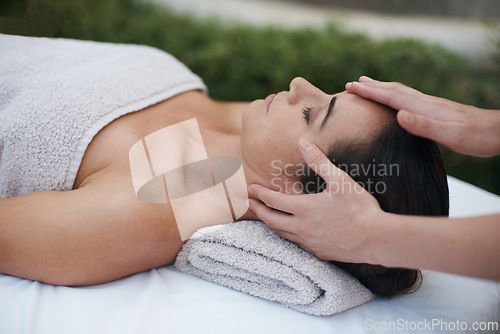 Image of Spa, woman and hands with massage for relax at resort, luxury hotel and vacation for wellness and therapeutic pamper. People, masseuse and body care with facial treatment, hospitality and zen outdoor