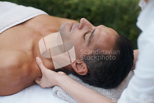 Image of Spa, man and shoulder with massage for relax at resort, luxury hotel and vacation for wellness and therapeutic pamper. People, masseuse and body care with skin treatment, hospitality and zen outdoor