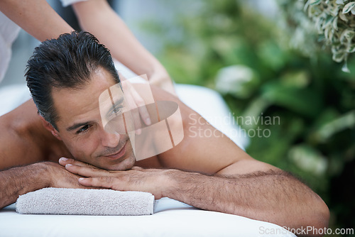 Image of Spa, man and back with massage for relax at resort, luxury hotel and vacation for wellness and therapeutic pamper. People, masseuse and body care with shoulder treatment, hospitality and zen outdoor