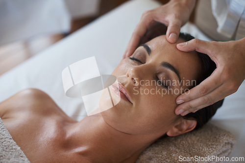 Image of Woman, hands and facial massage for skin care, pamper and beauty therapy for spa treatment. Female person, destress and dermatology for detox at luxury hotel, peace and cosmetics for wellness glow