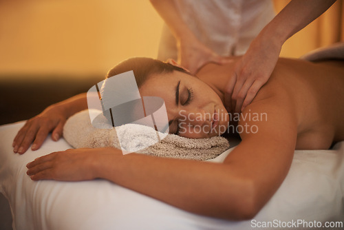Image of Relax, back massage and woman at spa for skincare, peace and calm at luxury resort at table. Beauty, therapy and person at salon for body treatment, health and hands of masseuse pamper for wellness