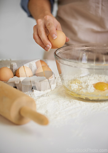 Image of Baking, kitchen and person with eggs and flour for cake, bread and pastry preparation in home. Culinary, bakery and closeup of ingredients, wheat and utensils for recipe, dough and food on counter