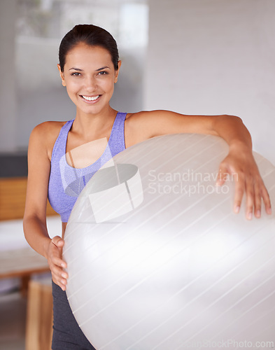 Image of Happy woman, portrait and fitness with ball for pilates, health and wellness at home. Face of female person or yogi with smile for gym equipment, training or workout in sports or wellbeing at house