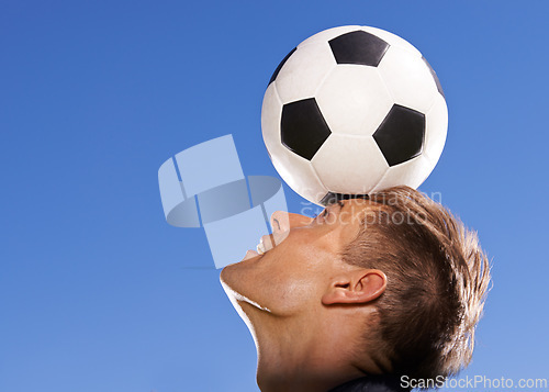 Image of Football, bounce and head with man, sports and training with competition and exercise. Person, blue sky and player with practice for a game or athlete with skills and technique with fitness or soccer