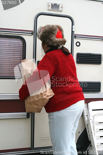 Image of Woman living in a trailer