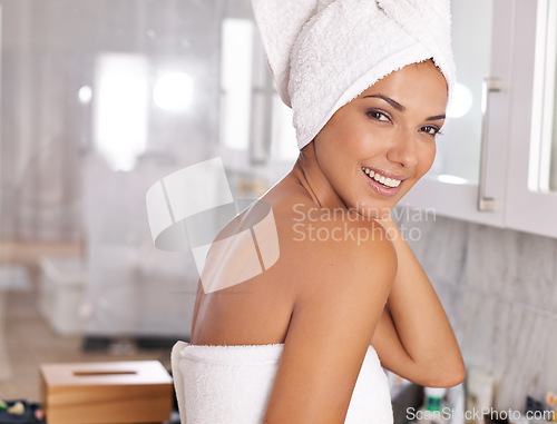 Image of Woman, towel and natural in bathroom, happy shower and hygiene at home with smile. Wash, clean or grooming skincare portrait for wellness or self care, glowing face routine for female person