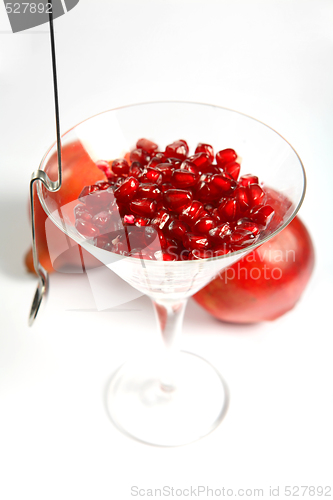 Image of Pomegranate seeds in a glass