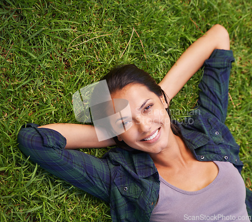 Image of Relax, nature and portrait of woman on grass for peace, satisfaction and good mood in outdoor park. Summer, green lawn and face of woman with happiness for rest, wellness and carefree enjoyment