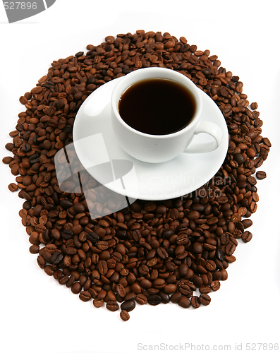 Image of Coffee in a cup with beans