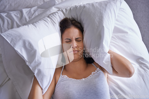Image of Bed, insomnia and woman frustrated with sleeping with anxiety, restless and unhappy on soft mattress. Apartment, home and female person depressed with mental health in bedroom of house at night