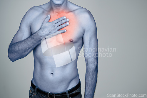 Image of Medical, chest pain and man with discomfort in studio with inflammation, heartburn or injury. Red glow, shirtless and person with healthcare emergency, ache or strain by gray background with mockup.