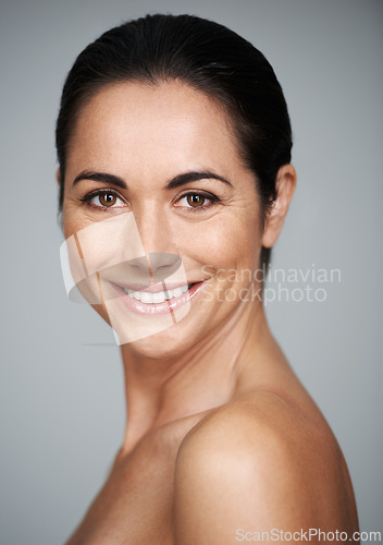 Image of Model, studio and portrait with smile, skin and care for treatment and proud. Woman, cosmetics and natural with lip gloss, glow and aesthetic for antiaging confidence isolated on white background