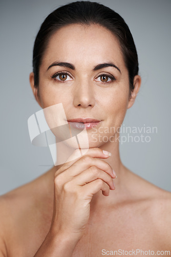 Image of Woman, studio and portrait with thinking, skin and care for treatment and proud. Model, cosmetics and natural with lip gloss, glow and aesthetic for antiaging confidence isolated on white background