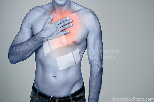 Image of Hand, chest pain or man with heartburn in studio with inflammation, discomfort or injury space. Red glow, topless body or person with healthcare emergency, ache or strain by grey background mockup