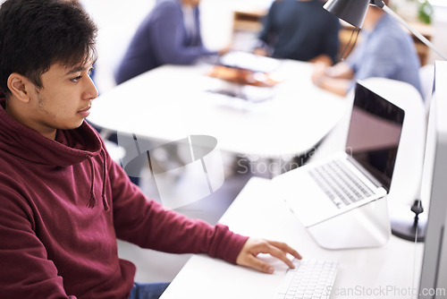 Image of Laptop, programmer and man typing for update in office with information technology for cybersecurity. Coder, employee and male person writing on keyboard for test of software and application