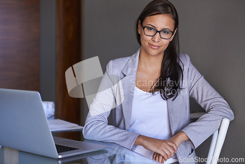Image of Portrait and laptop for businesswoman in office, and desk for professional person. Face, happy and technology for attorney lawyer in workplace, eyewear and computer for legal research for case