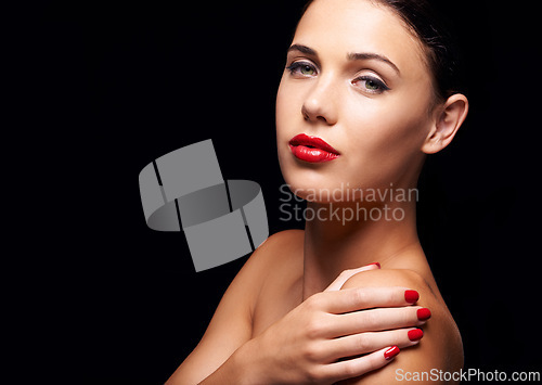 Image of Woman, beauty and red lipstick in studio, cosmetic and makeup with nail polish for stylish, elegant and edgy model. Cosmetology for female person with spa manicure, skincare with vibrant colour
