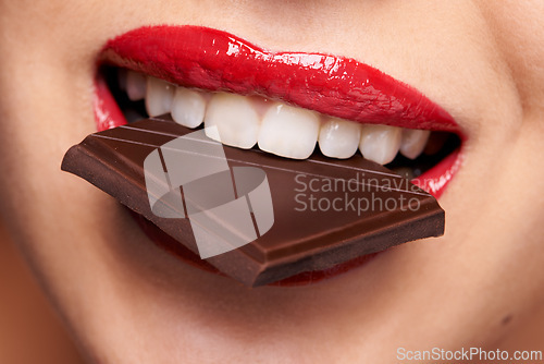 Image of Chocolate bar, beauty and woman with red lips for lipstick cosmetics, makeup and skincare. Sweets, macro and female model person in cheat meal for cocoa product, unhealthy snack or eating candy