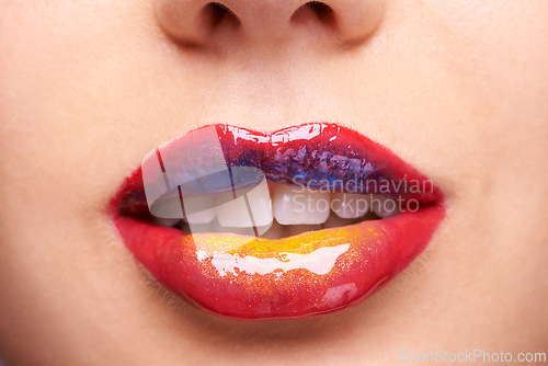 Image of Lipstick, creative makeup and mouth of woman for luxury, wellness and products with colors. Salon aesthetic, cosmetology and closeup of lips of person with lip gloss, shine and cosmetics in studio