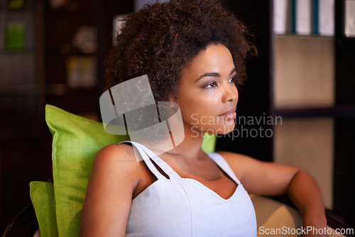 Image of Woman, thinking and relax for idea in home or indoor on couch and comfy on break or weekend on mockup. African person, attractive and pensive for peace, rest or chill in living room or house on sofa