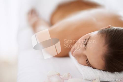 Image of Woman, massage and ready for treatment, lying and beauty therapy for body care at spa. Female person, relax and serene or dermatology, cosmetics and rest at resort hotel and peace or pamper at salon