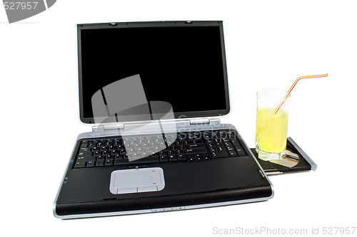 Image of The laptop and cocktail. Isolated on white background