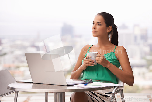 Image of Woman, outdoor and thinking with coffee and laptop for remote work in trade, business or planning strategy. Entrepreneur, investor and drink espresso on balcony in city with ideas for stocks in notes