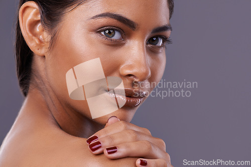 Image of Skincare, manicure and woman with makeup, glow and dermatology on grey studio background. Person, model and girl with grooming routine or luxury with cosmetics or shine with aesthetic and nail polish