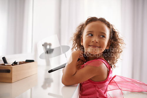 Image of Child, playing and mirror with makeup for costume, ballet or performance with cosmetics or smile. Naughty, playful girl and happy kid in with a fantasy, foundation or blusher in the home or house