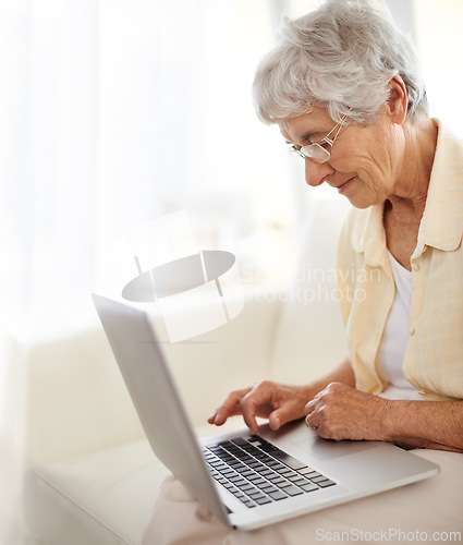 Image of Senior woman, laptop and home planning for reading, typing or search an ebook on internet. Happy elderly person with computer for learning, website and online crossword game for sign up information