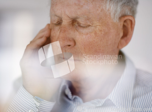 Image of Old man, pain and headache migraine in retirement with burnout fatigue for stressed pressure, worry or mental health. Elderly, tired person and hand for temple with anxiety, frustrated or unhappy