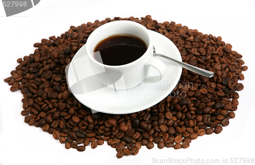 Image of Coffee in a cup with beans