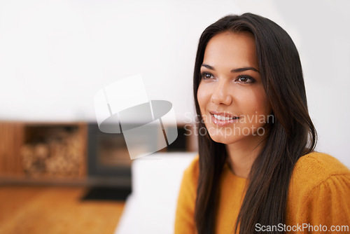 Image of Woman, relax and thinking on sofa in living room for wellness, comfort and smile in home. Happiness, face and Mexican female person on couch for calm, weekend off and peaceful lounge day in house