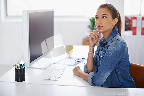 Image of Woman, thinking and choice with computer for creative startup, idea or brainstorming at the office. Female person or employee in wonder or thought for design, decision or planning at the workplace