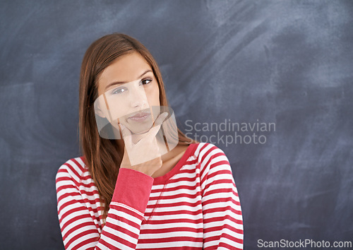 Image of Woman, teacher and thinking in portrait by blackboard, education and contemplating school curriculum. Female person, ideas and problem solving in classroom, knowledge and planning for lesson at work