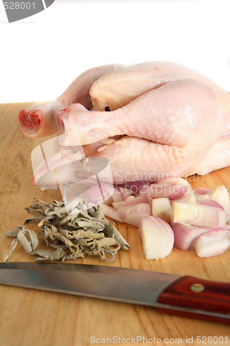 Image of Chicken with sage, onion and knife