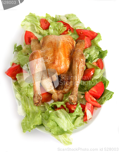 Image of Roast chicken on a bed of salad