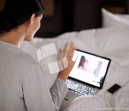 Image of Video call, laptop screen and wave with woman in bedroom for communication, internet and online chat. Virtual, back view and female person in bed for social media, conversation and webcam at home