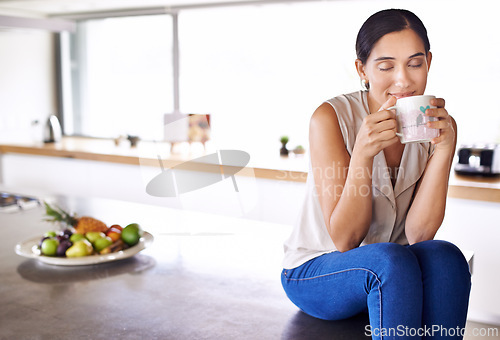 Image of Woman, drink and smell coffee in kitchen or morning, enjoying and holding mug or cup. Female person, relaxing and tea or expresso for breakfast or energy at home, eyes closed and smile while sitting