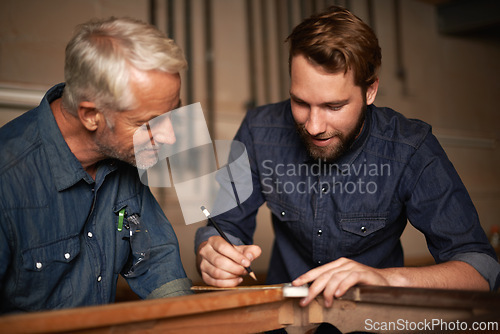 Image of Man, coach and smile with wood, workshop and family business or apprenticeship. Mature father, son and creative with artisan, carpentry and together for startup and mentor or learning with happiness