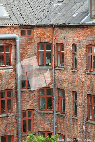 Image of Town, building and apartment with vintage architecture for historic, classic and ancient design in England. Traditional cultural and structure with residential property in small neighborhood