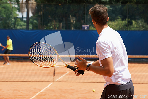Image of People, playing and competition on tennis court, athlete and action with ball to score. Opponent, intensity and training in set in tournament, fitness and target of professional player in summer game