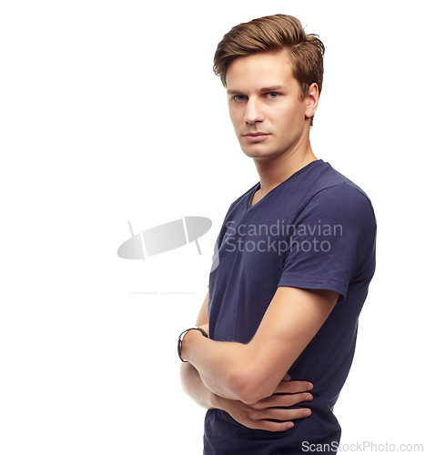 Image of Man, serious and portrait with white background for fashion with assertive look for model, casual and outfit with arms crossed. Male person, isolated in studio for copy space with relaxed t-shirt