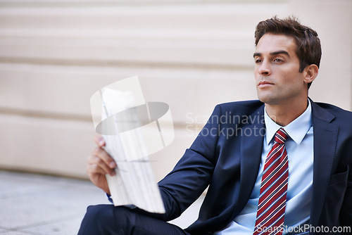 Image of Thinking, business man and newspaper in city outdoor for opportunity, dream or vision. Inspiration, idea and lawyer in urban town with decision, problem solving and serious employee planning future