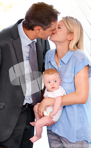 Image of Love, family and parents kiss with baby, bonding or affection at home on valentines day. Child, toddler or mother with father in romance for connection, care or healthy relationship together in house